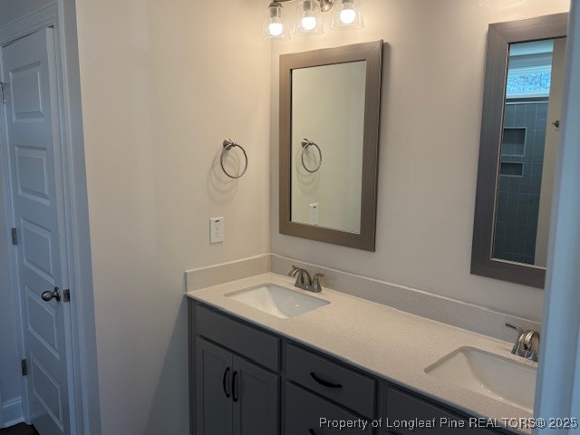 178 Surles Landing Way Benson, NC 27504 - Photo 17 of 21 a bathroom with a sink vanity granite and a mirror