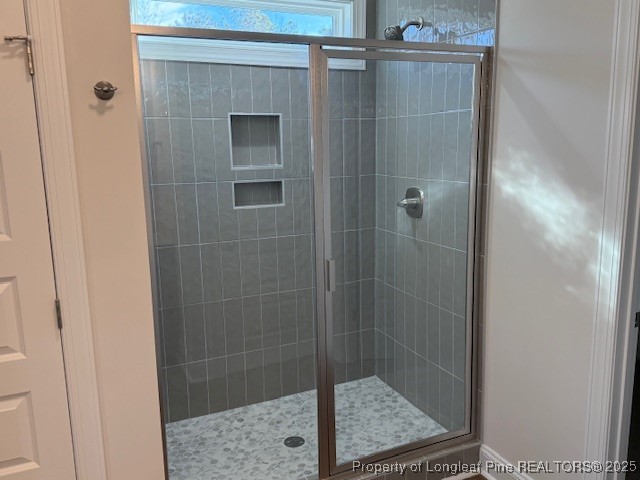 178 Surles Landing Way Benson, NC 27504 - Photo 18 of 21 a bathroom with a shower and toilet