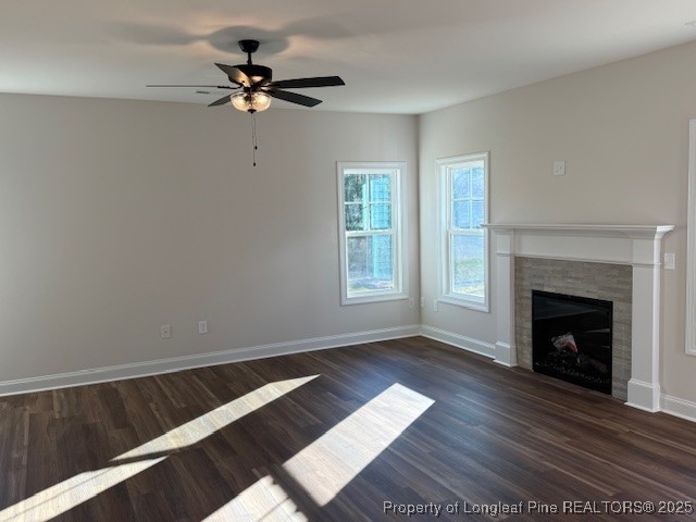 178 Surles Landing Way Benson, NC 27504 - Photo 6 of 21 a view of an empty room with wooden floor a fireplace and a window