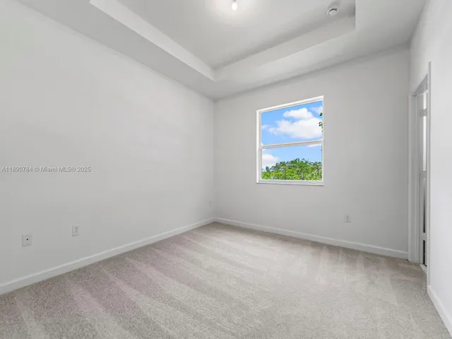 an empty room with window