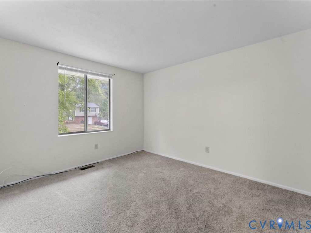 9611 Kennesaw Road Chesterfield, VA 23236 - Photo 17 of 20 an empty room with windows