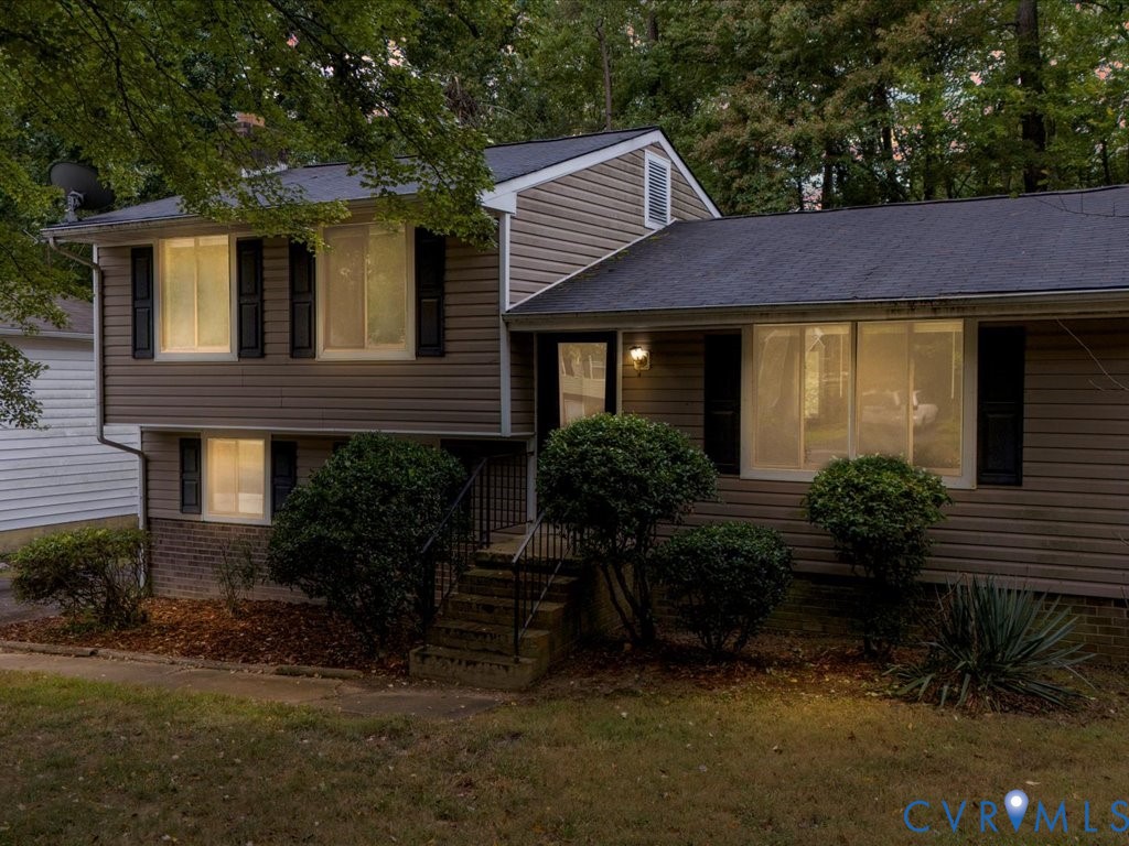 9611 Kennesaw Road Chesterfield, VA 23236 - Photo 2 of 20 a front view of house with a garden