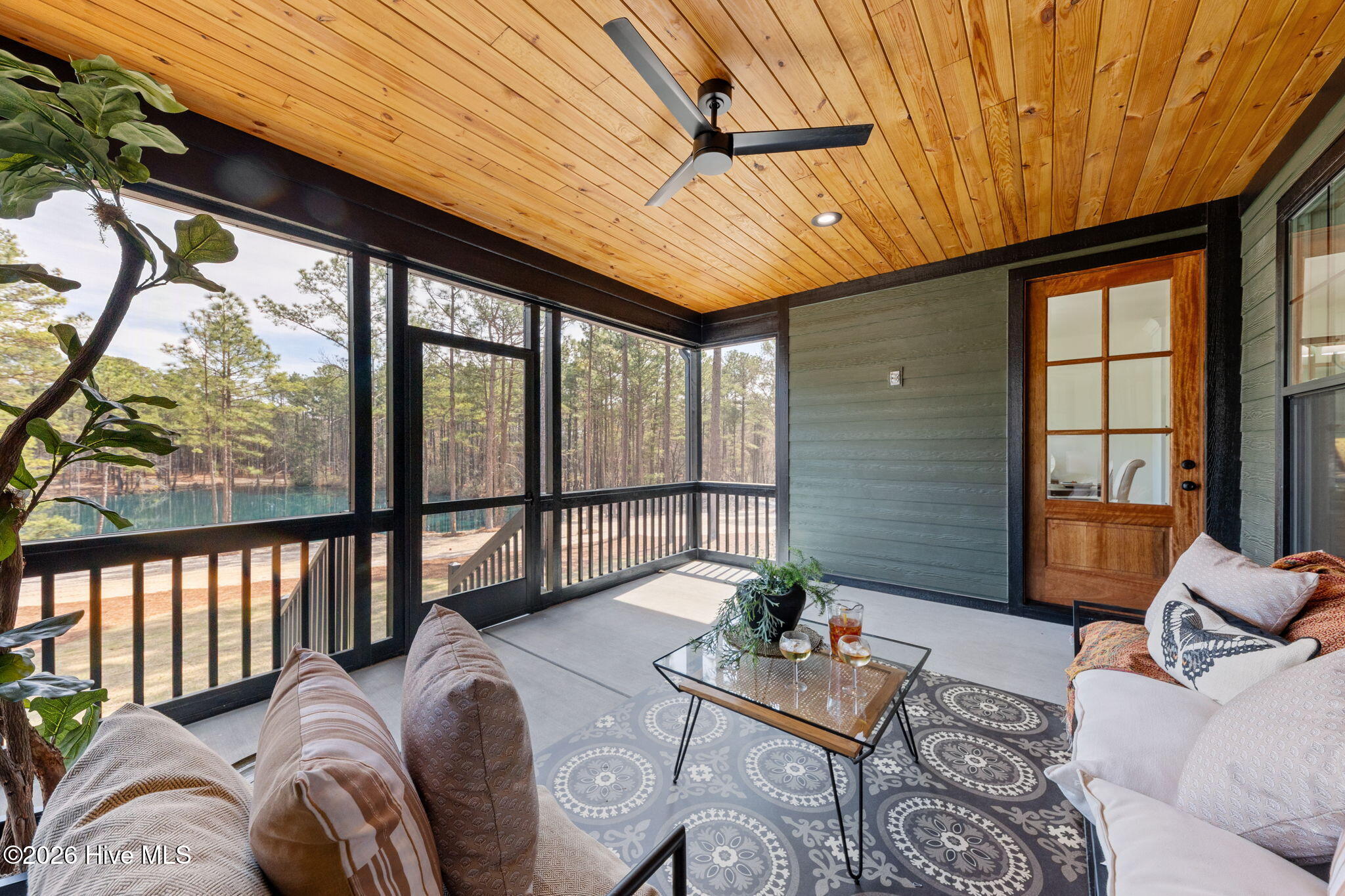 2841 Murdocksville Road West End, NC 27376 - Photo 4 of 68 Screened Porch Overlooking Pond