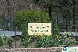 a sign on the side of the road