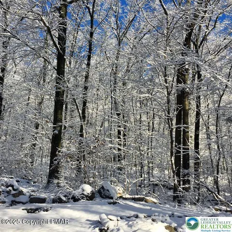 a brick building with a trees