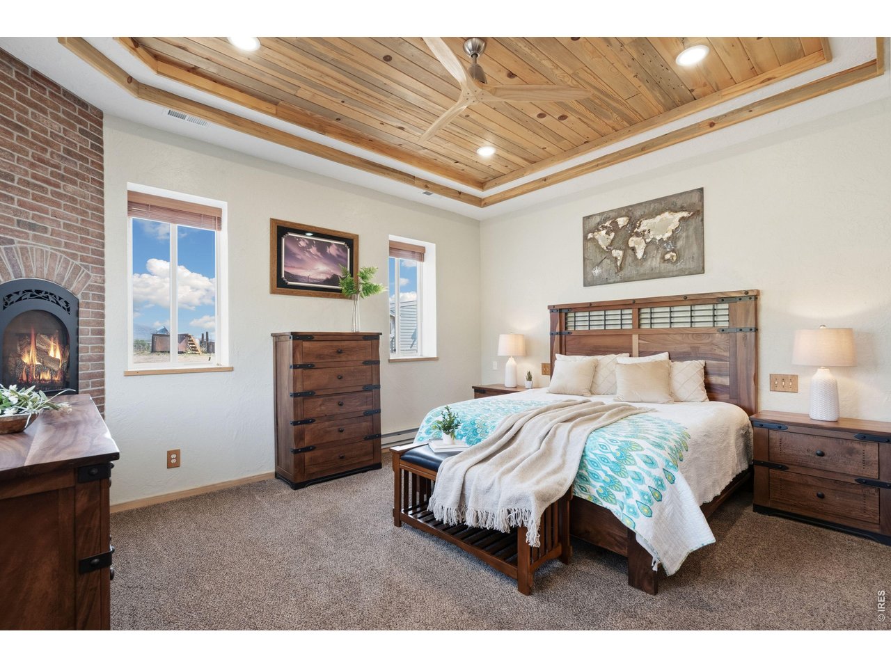 54 Rist View Road Bellvue, CO 80512 - Photo 14 of 50 Primary Bedroom with gas fireplace!