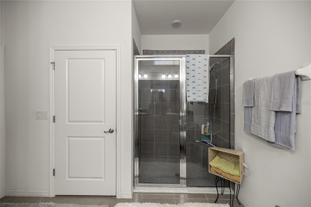 6474 Southwest 89th Loop Ocala, FL 34476 - Photo 14 of 34 a bathroom with a shower