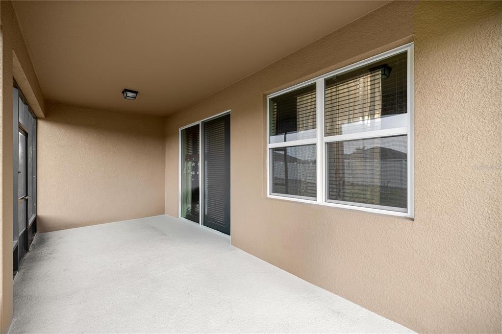 6474 Southwest 89th Loop Ocala, FL 34476 - Photo 20 of 34 a view of an empty room with a window