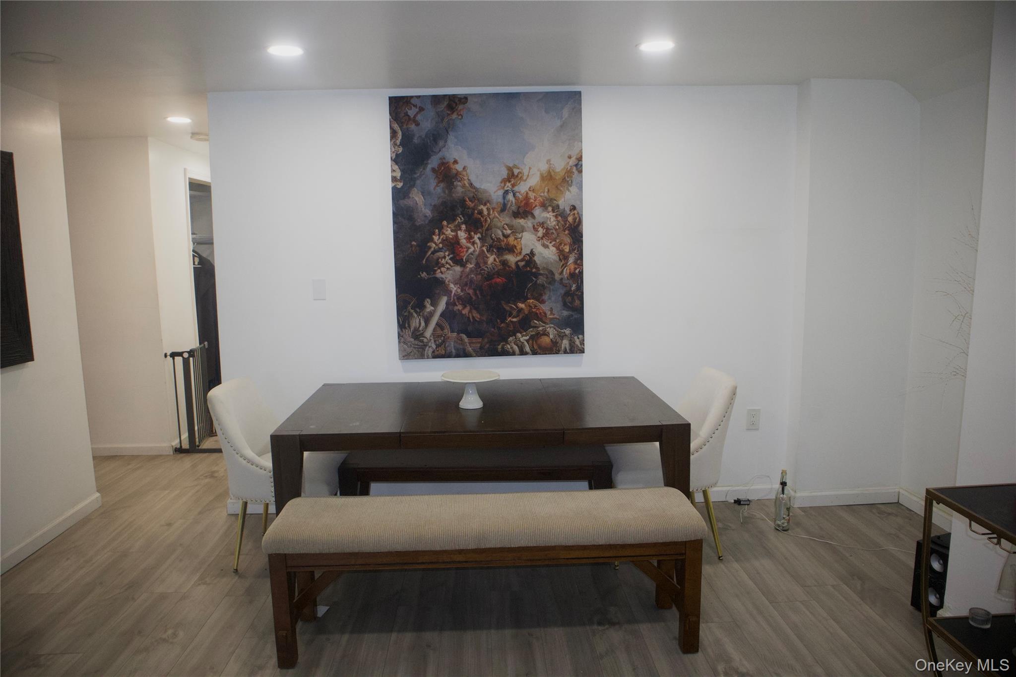 147-15 223rd Street Queens, NY 11413 - Photo 4 of 21 a bedroom with a bed and wooden floor