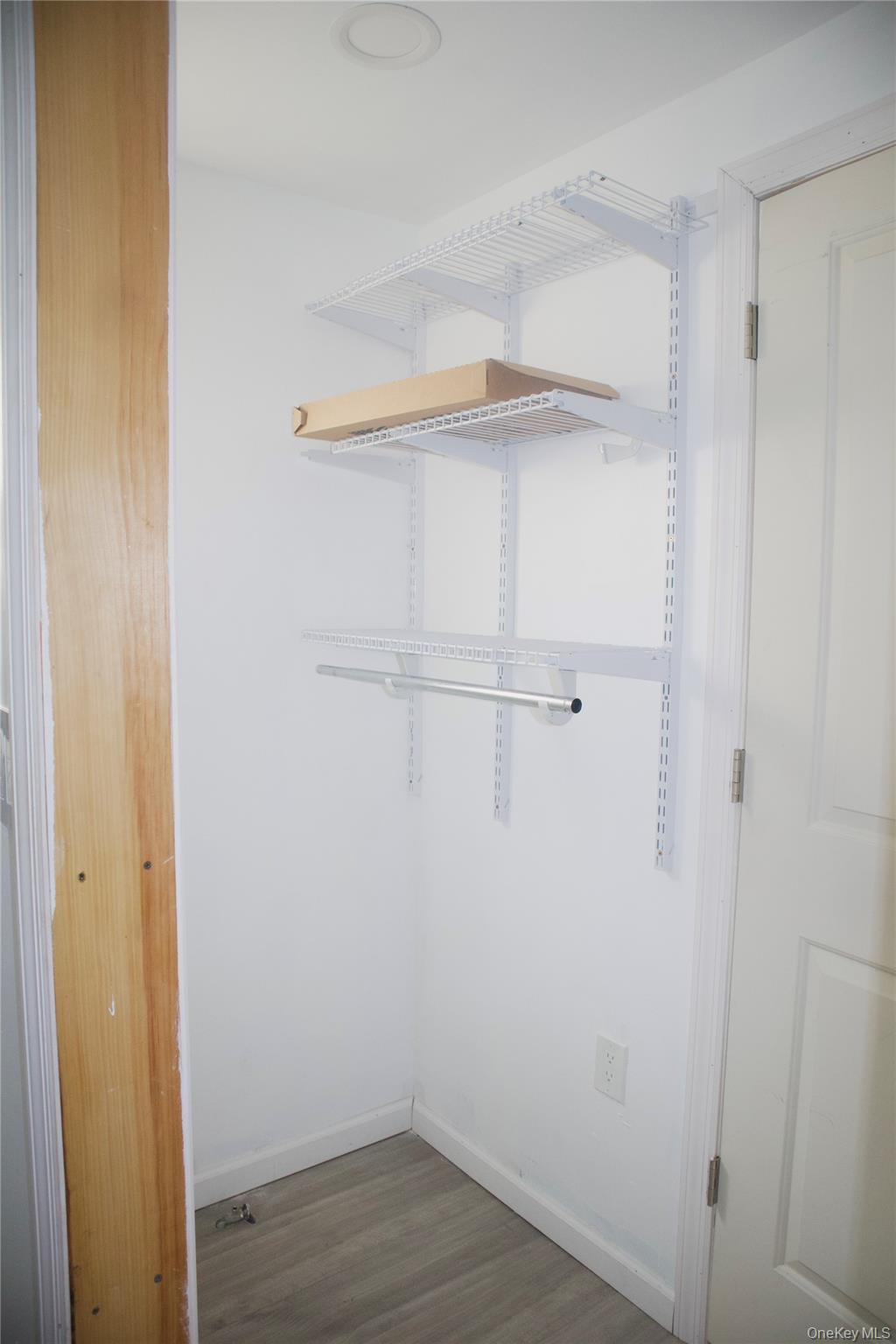 147-15 223rd Street Queens, NY 11413 - Photo 10 of 21 a view of small space with racks on the wall