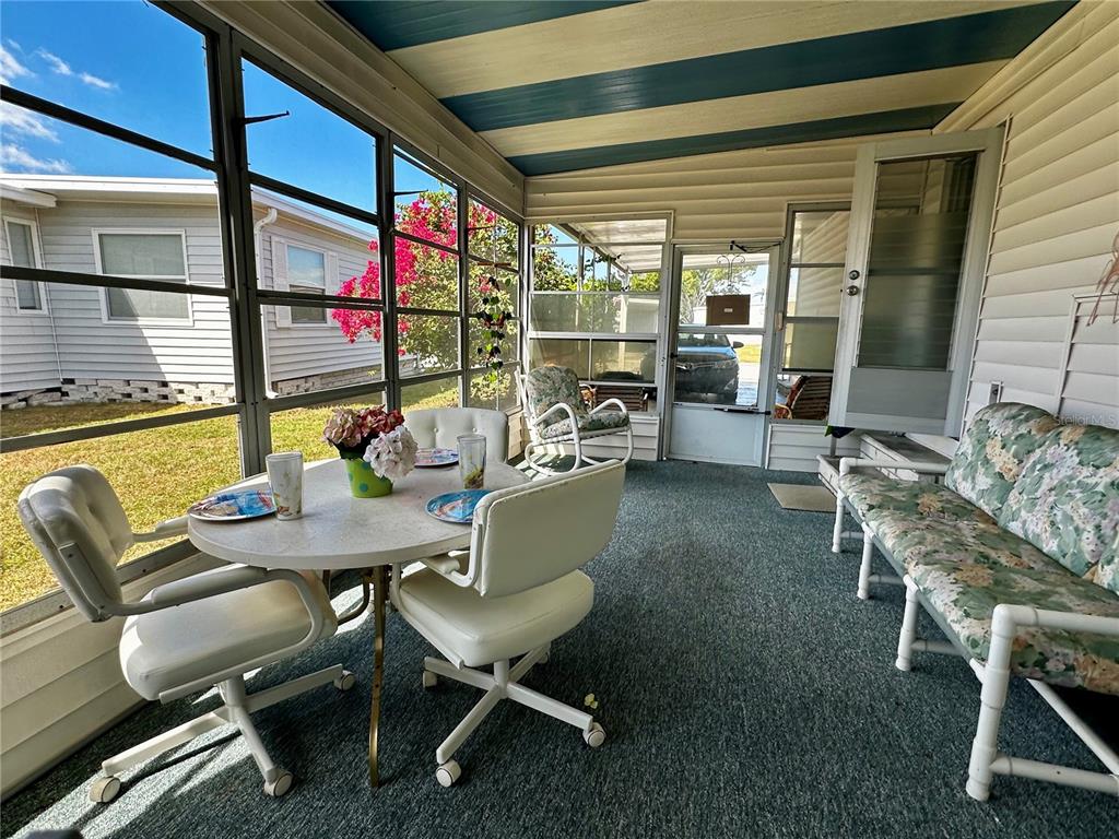 1100 South Belcher Road, Unit 523 Largo, FL 33771 - Photo 20 of 56 a view of a dining room with furniture window and outside view