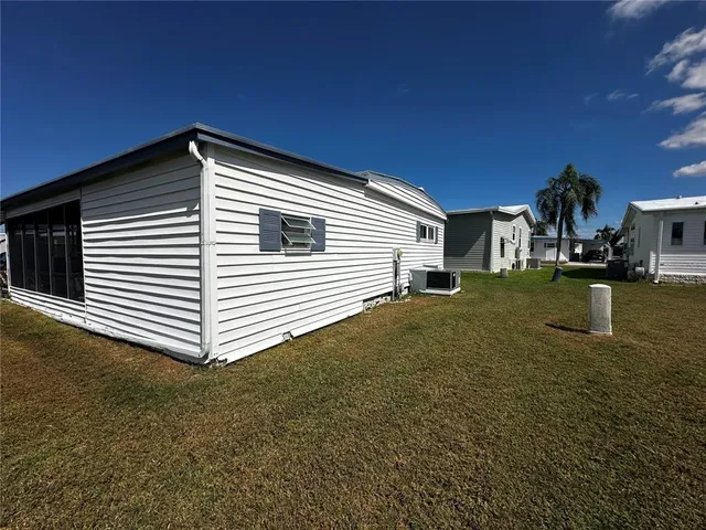 a view of a swimming pool and an outdoor space