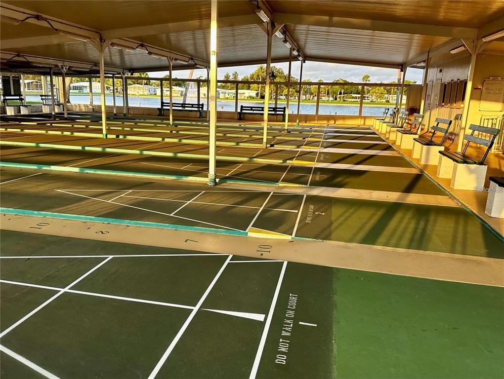 1100 South Belcher Road, Unit 523 Largo, FL 33771 - Photo 27 of 56 a view of a tennis court