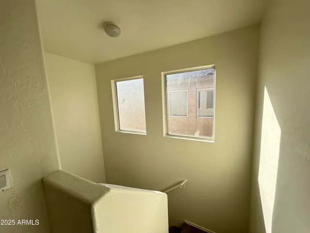 a bathroom with a toilet and a sink