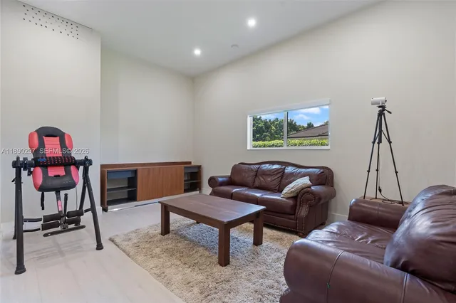 an aerial view of house with a swimming pool