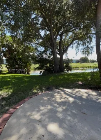 a view of a park with tree s