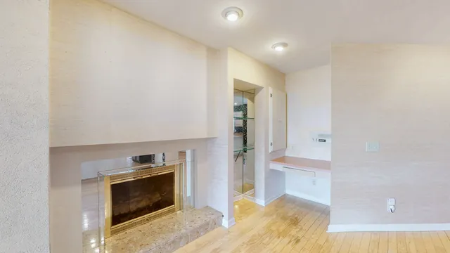 a view of a room with a large window