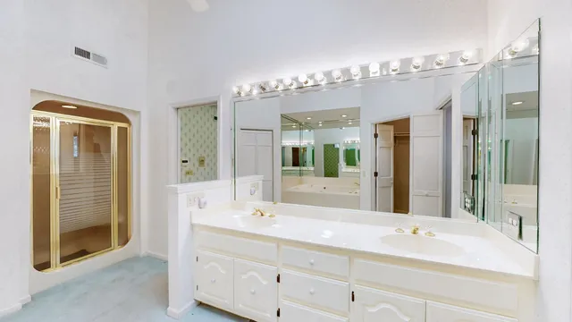 a bathroom with a toilet and a shower curtain