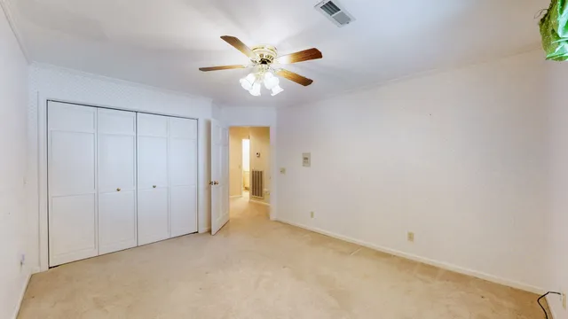 a view of a deck with wooden floor and iron fence