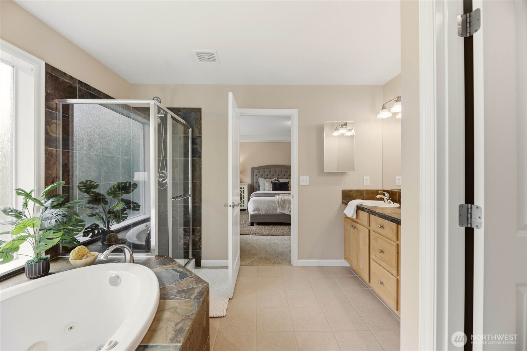 3501 156th Place Southeast Bothell, WA 98012 - Photo 22 of 36 a bathroom with a tub sink and mirror