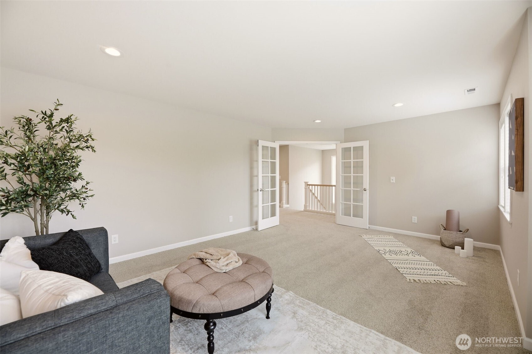 3501 156th Place Southeast Bothell, WA 98012 - Photo 24 of 36 a living room with furniture and a potted plant