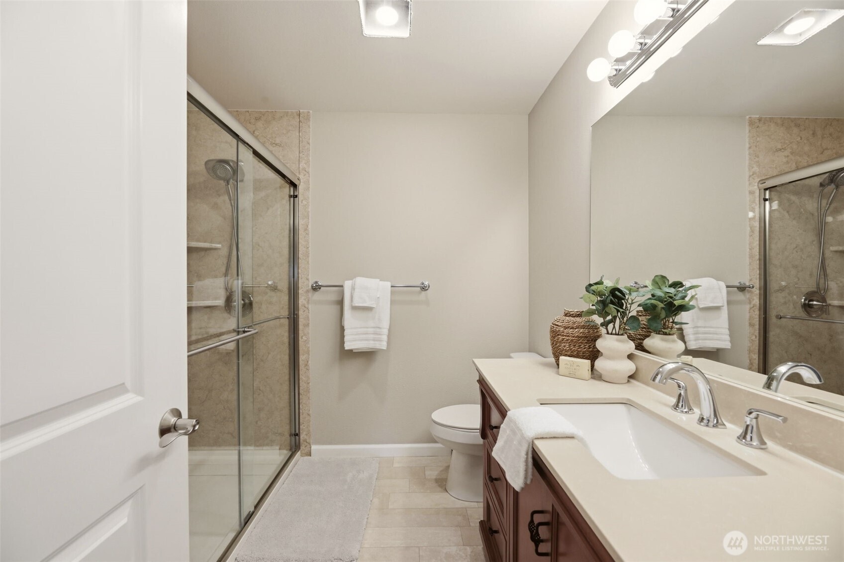 3501 156th Place Southeast Bothell, WA 98012 - Photo 25 of 36 a bathroom with a sink toilet and shower