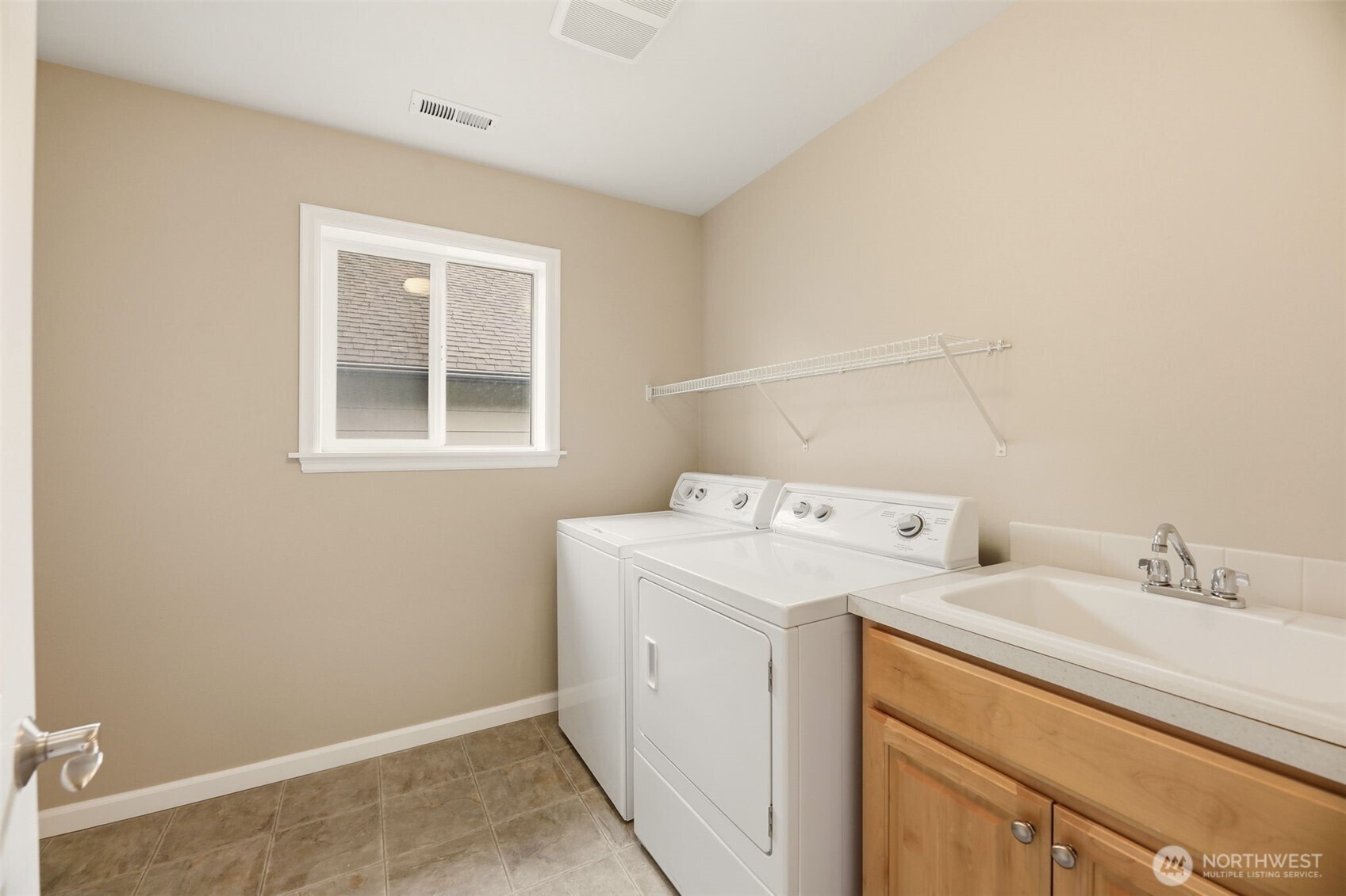 3501 156th Place Southeast Bothell, WA 98012 - Photo 29 of 36 a utility room with dryer and washer