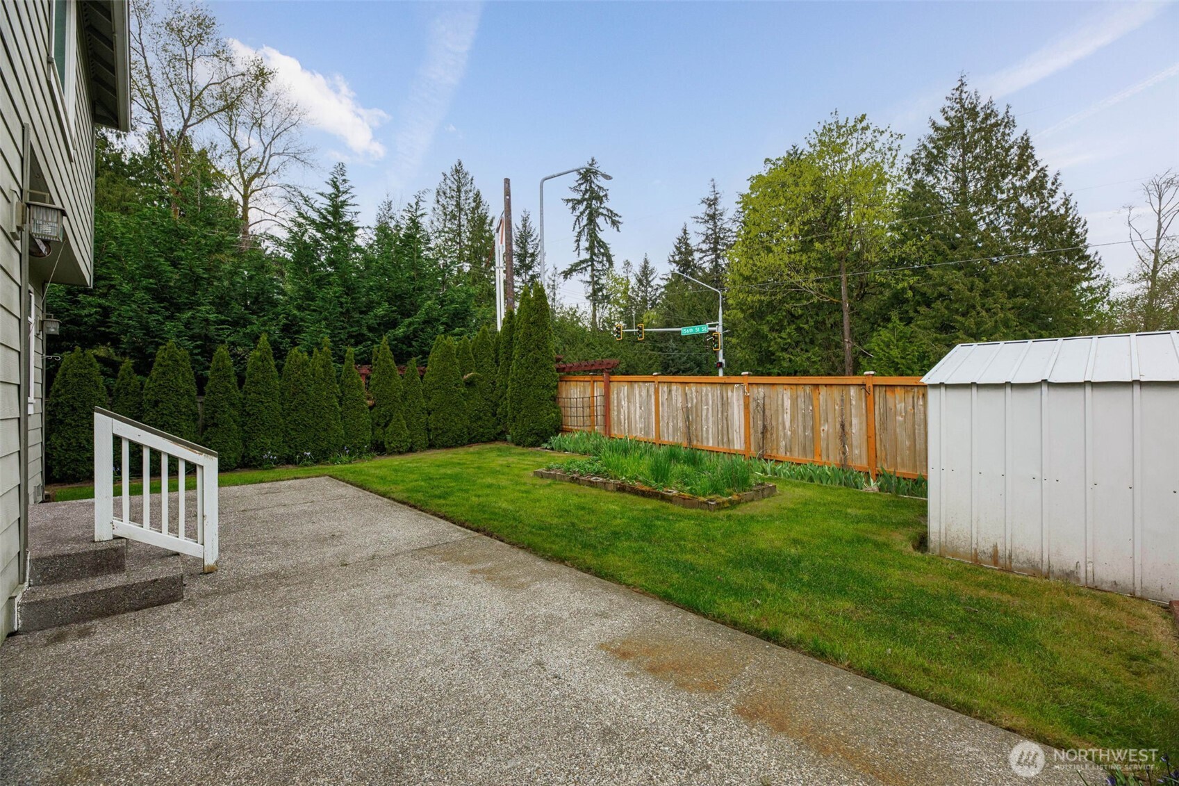 3501 156th Place Southeast Bothell, WA 98012 - Photo 30 of 36 a view of a house with backyard and trees