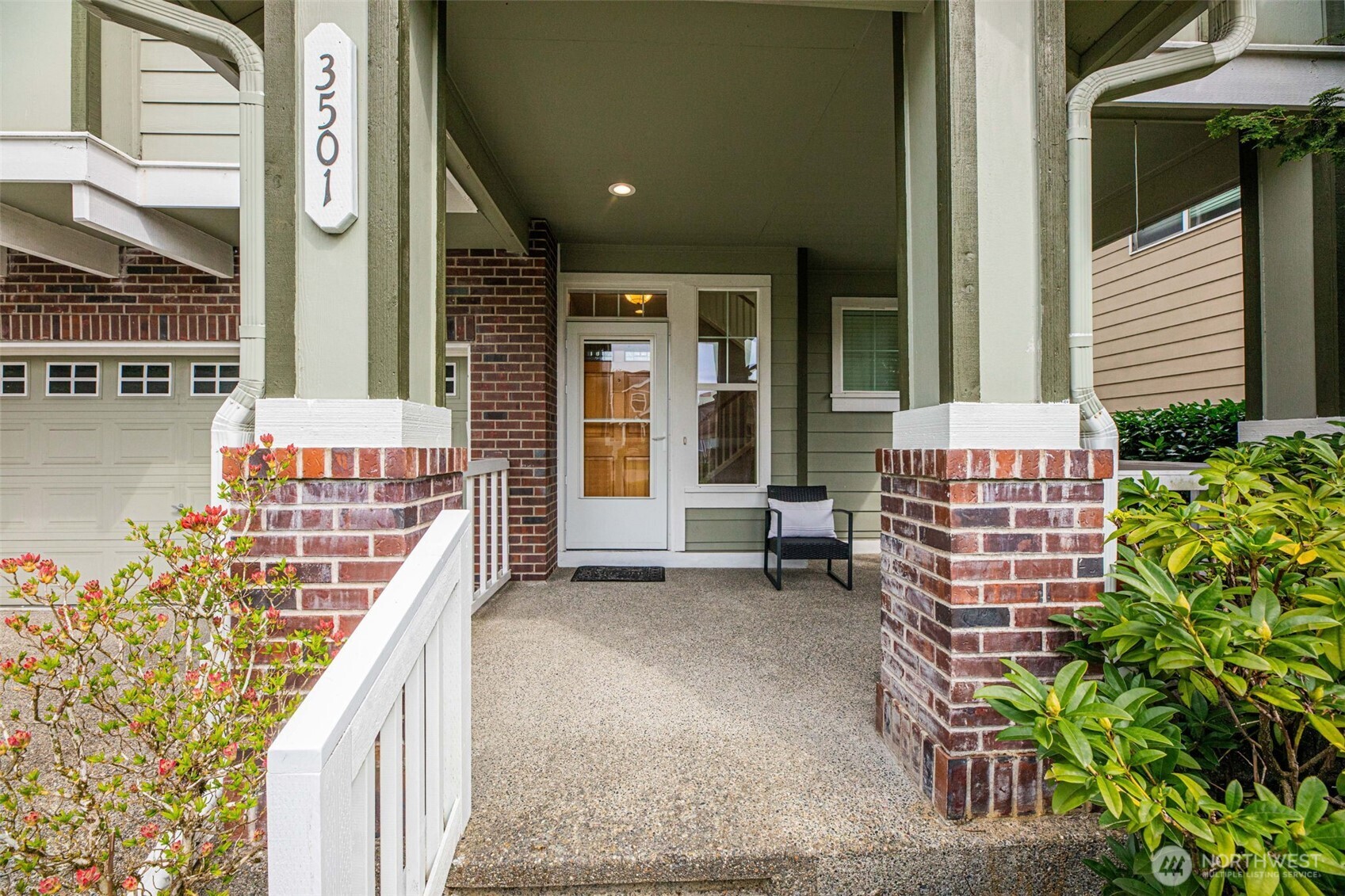 3501 156th Place Southeast Bothell, WA 98012 - Photo 3 of 36 a balcony with furniture and a potted plant