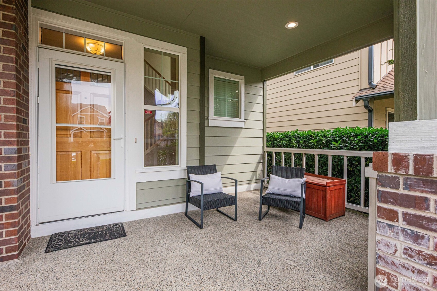 3501 156th Place Southeast Bothell, WA 98012 - Photo 4 of 36 a balcony with furniture and a window