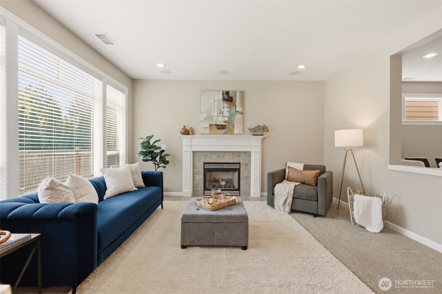 3501 156th Place Southeast Bothell, WA 98012 - Photo 9 of 36 a living room with furniture and a fireplace