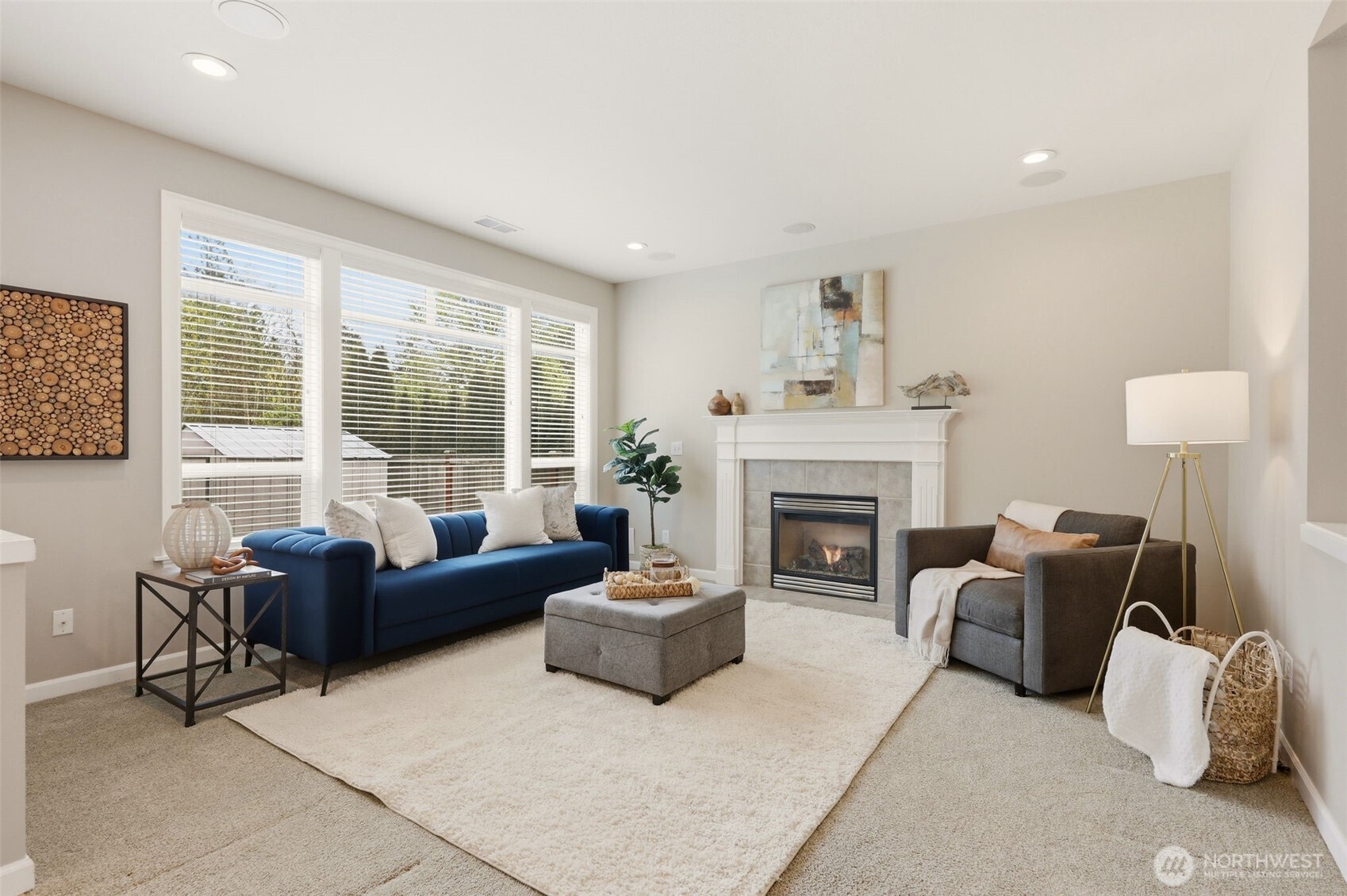 3501 156th Place Southeast Bothell, WA 98012 - Photo 10 of 36 a living room with furniture and a fireplace