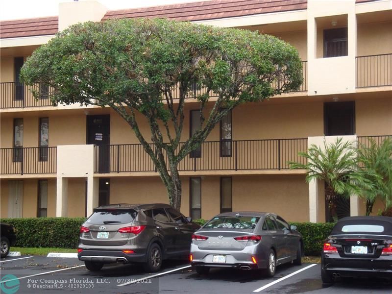 Coral Gate Margate, FL 33063 - Photo 28 of 28 a car parked in front of a house