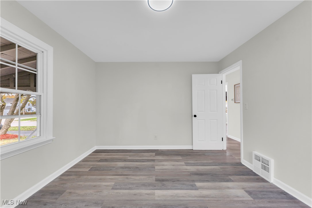 28920 Ridge Road Wickliffe, OH 44092 - Photo 14 of 27 Spare room with hardwood / wood-style flooring