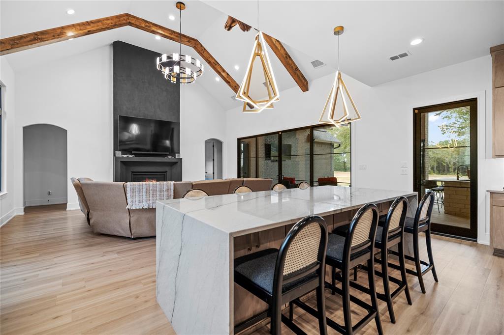 2804 Buchanan Road Hallsville, TX 75650 - Photo 11 of 40 a large kitchen with a table and chairs