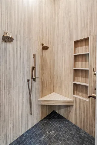 a bathroom with a sink toilet and a shower