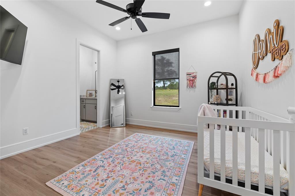 2804 Buchanan Road Hallsville, TX 75650 - Photo 28 of 40 a view of a livingroom with wooden floor and a window