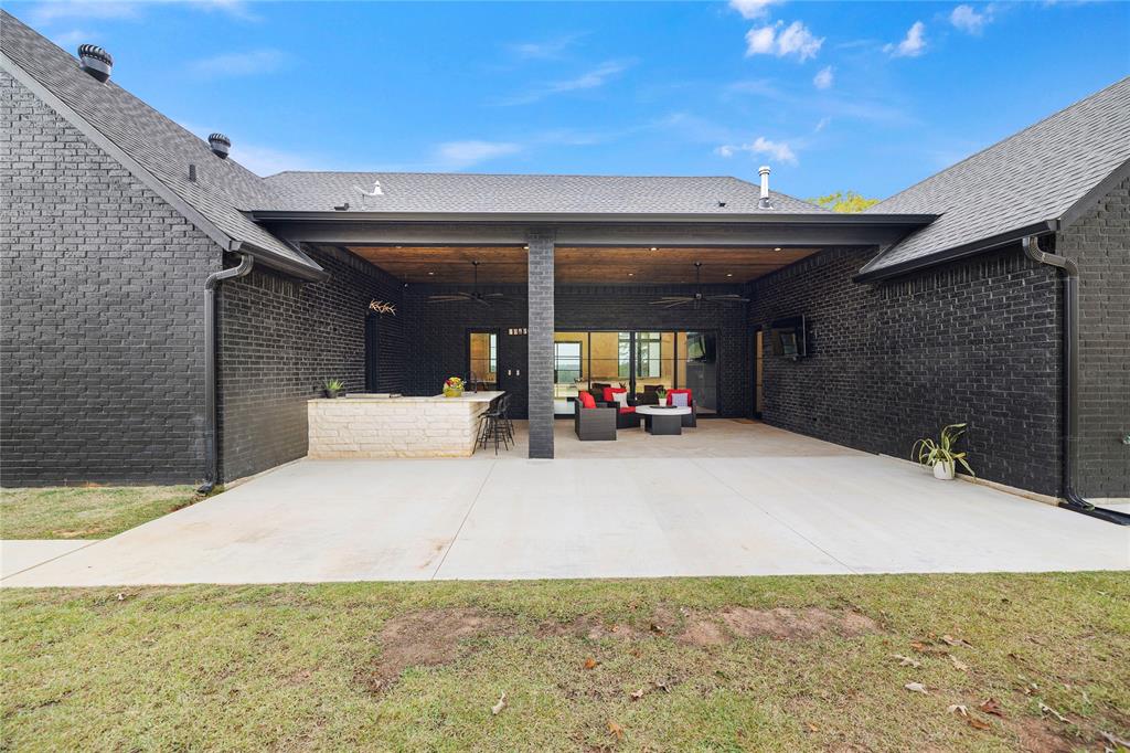 2804 Buchanan Road Hallsville, TX 75650 - Photo 37 of 40 a view of a patio with table and chairs