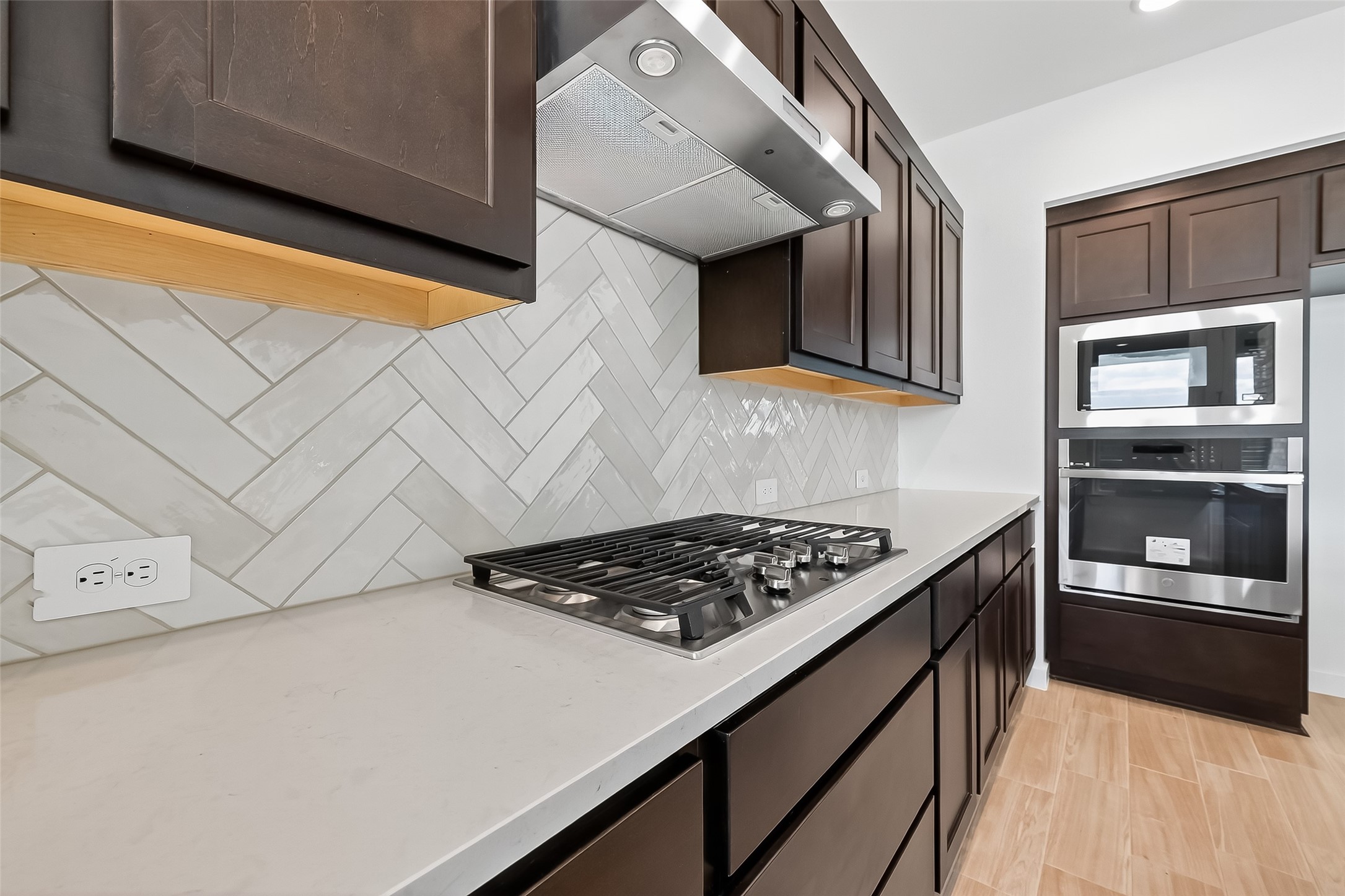 3222 Kindred Way Richmond, TX 77406 - Photo 20 of 50 a kitchen with stainless steel appliances granite countertop a stove and a microwave