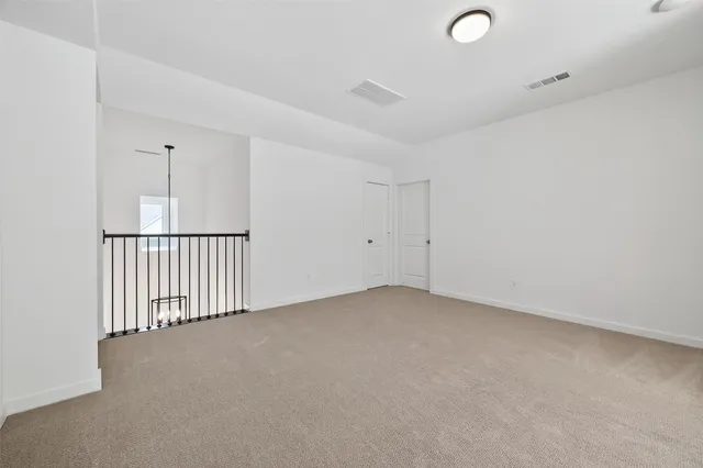 a view of a livingroom with a staircase