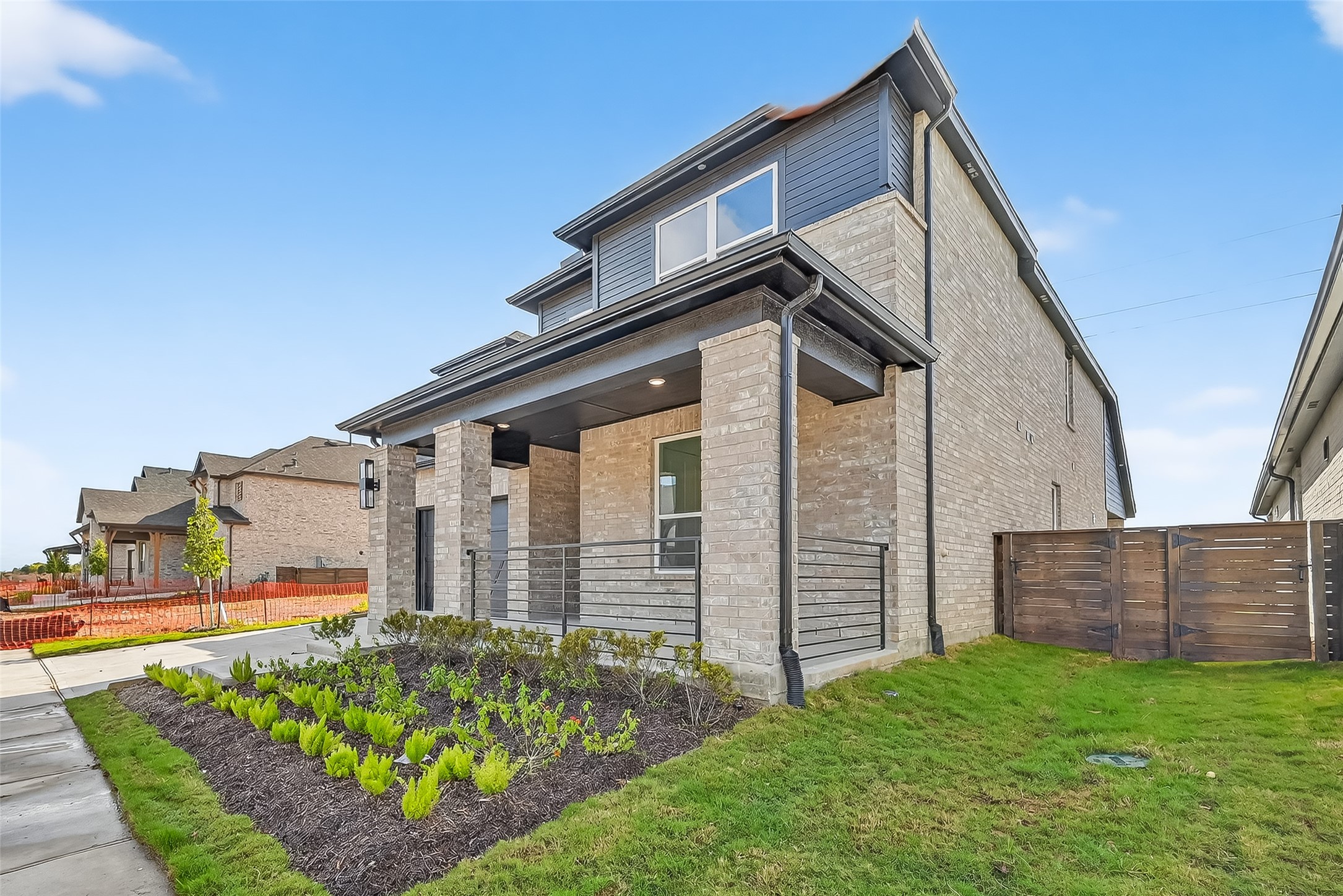 3222 Kindred Way Richmond, TX 77406 - Photo 3 of 50 a front view of a house with garden