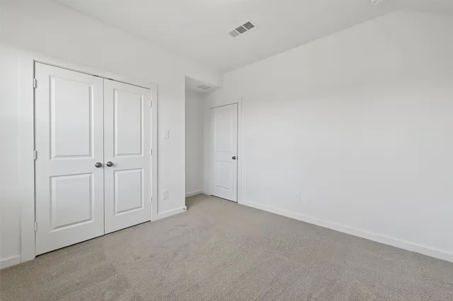 a bathroom with a sink toilet and vanity