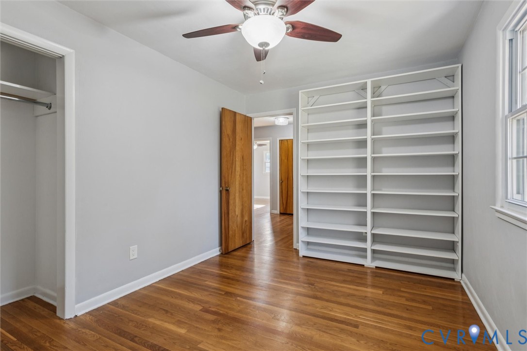 4 Michele Drive Hampton, VA 23669 - Photo 22 of 36 a view of an empty room with a window and wooden floor