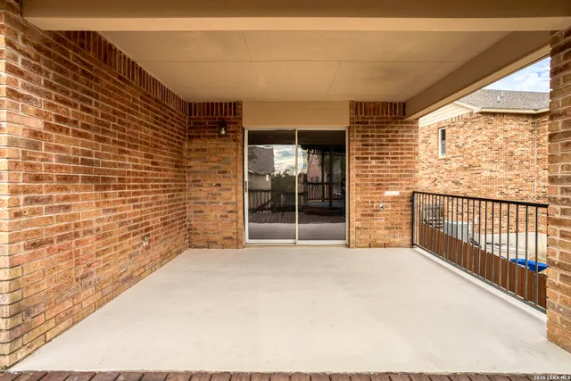 a view of an empty room with a balcony