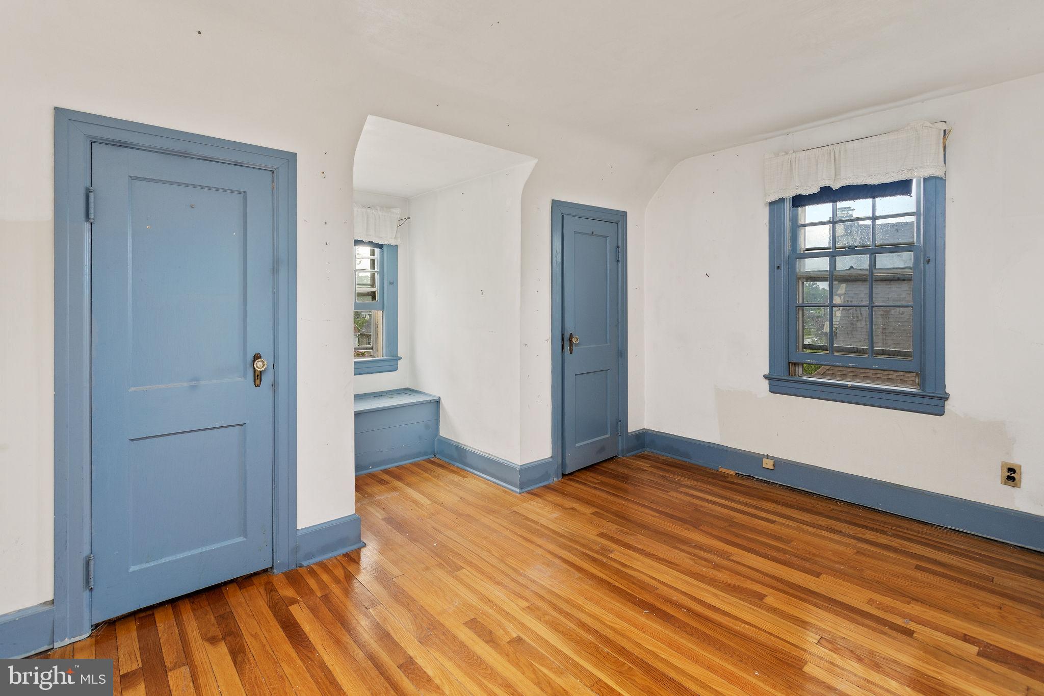 10 Pershing Avenue Ewing, NJ 08618 - Photo 17 of 24 wooden floor in an empty room with a window