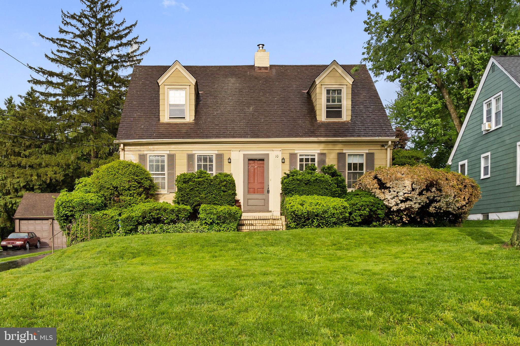 10 Pershing Avenue Ewing, NJ 08618 - Photo 2 of 24 a front view of a house with a yard