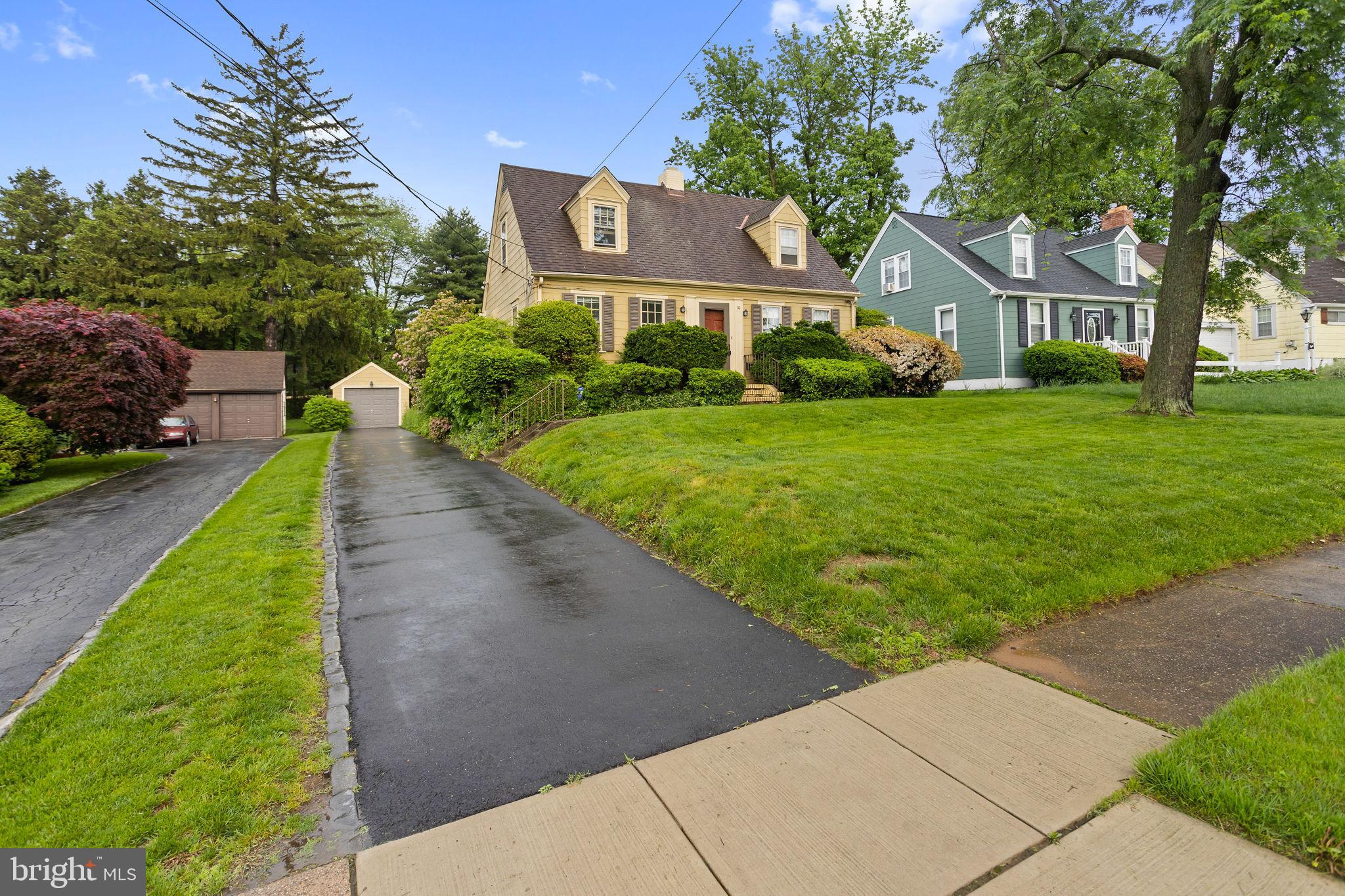 10 Pershing Avenue Ewing, NJ 08618 - Photo 4 of 24 a front view of a house with garden