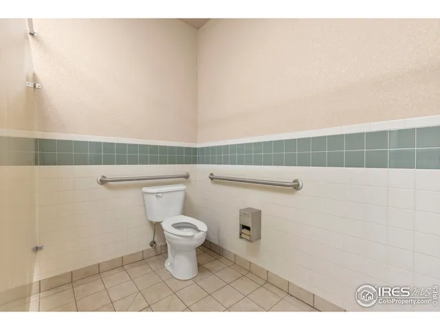 a bathroom with a sink a mirror and a shower