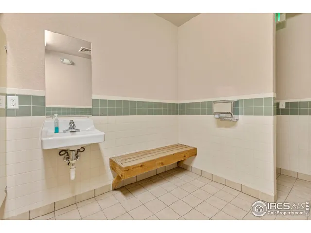 a view of a balcony with furniture