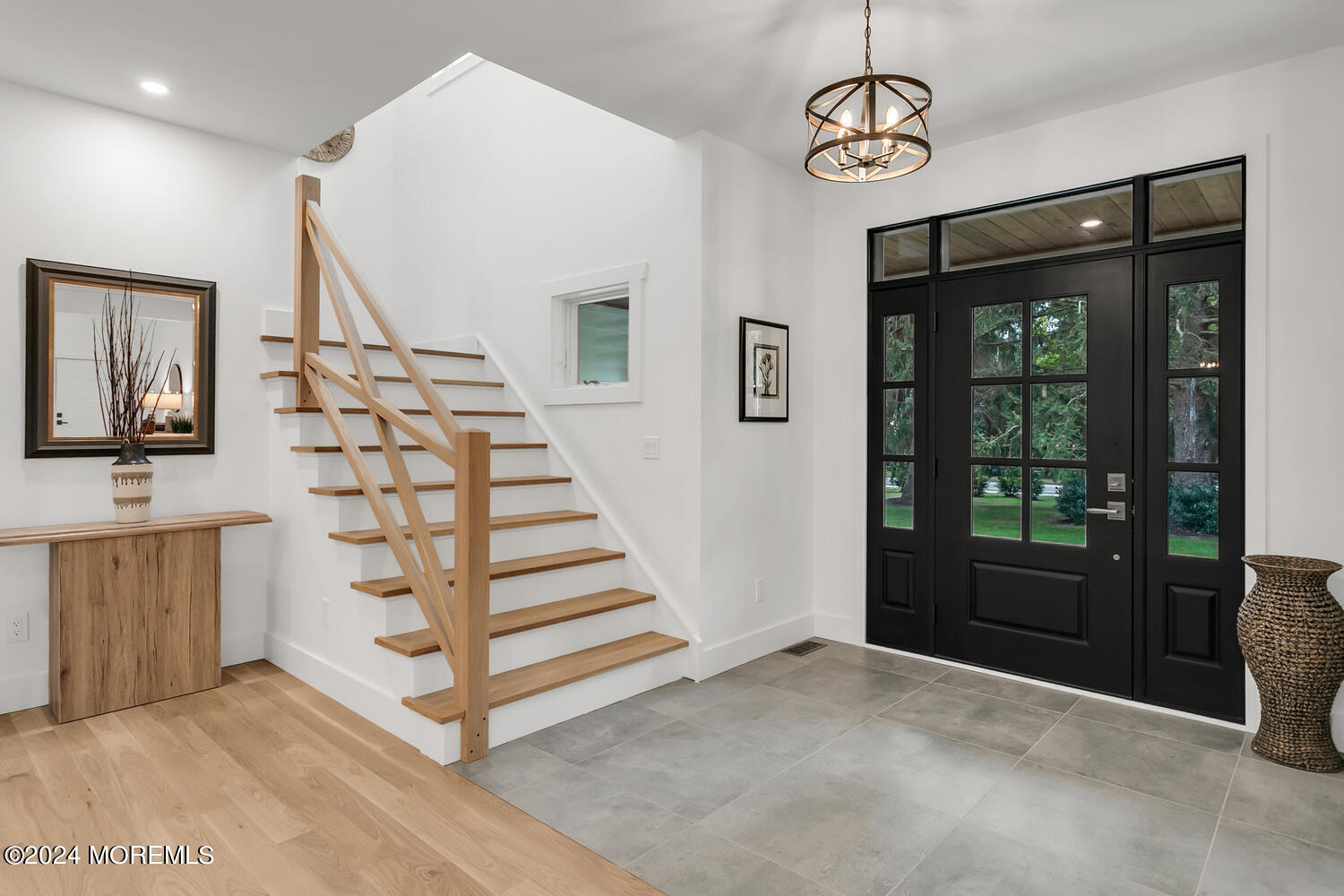 407 Rumson Road Little Silver, NJ 07739 - Photo 3 of 39 a view of entryway with stairs and wooden floor